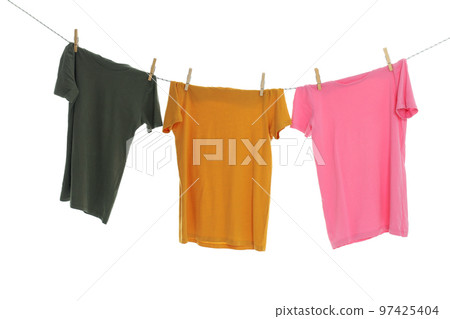 T-shirts hanging on twine, isolated on white background 97425404
