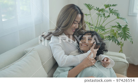 Holiday concept of 4k Resolution. Asian women embracing each other in the house. Young women are in a mutual lesbian love relationship. 97426554