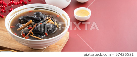 Delicious silky chicken soup with Chinese herbal medicine 97426581