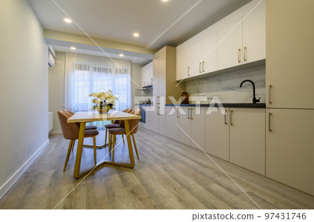 Large beige and cream luxury kitchen interior 97431746
