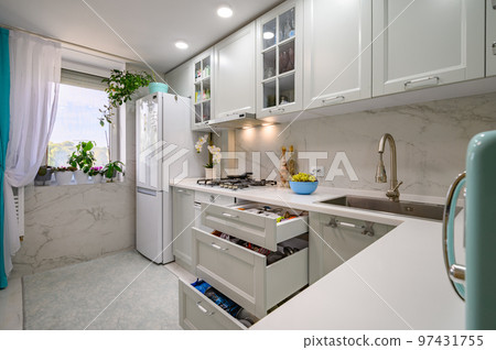 White new modern well designed kitchen interior White new modern well designed kitchen interior 97431755