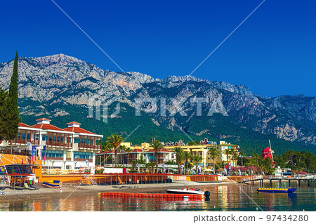 Beautiful view of the coastline of Kemer. Mountains and sea, Kemer beach, Turkey Beautiful view of the coastline of Kemer. Mountains and sea, Kemer beach, Turkey 97434280
