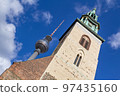 Berlin Television Tower and the Church of Saint Mary in Berlin in Germany. 97435160