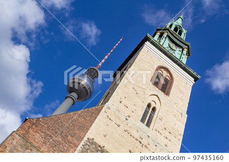 Berlin Television Tower and the Church of Saint Mary in Berlin in Germany. Berlin Television Tower and the Church of Saint Mary in Berlin in Germany. 97435160