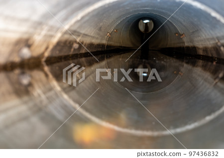 water surface level view from inside a concrete culvert 97436832