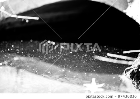 full capacity concrete culvert with sheen contaminated storm water runoff 97436836