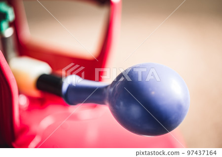 Selective focus on edge of an inflatable balloon attached to a helium canister. 97437164