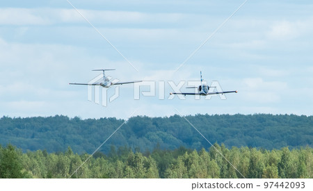 Training aircraft Aero L-39 Albatros and Aero L-29 Delfin perform a training flight at the Oreshkovo airfield. 97442093