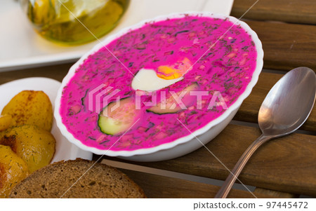 Plate with cold borscht is refreshing dish 97445472