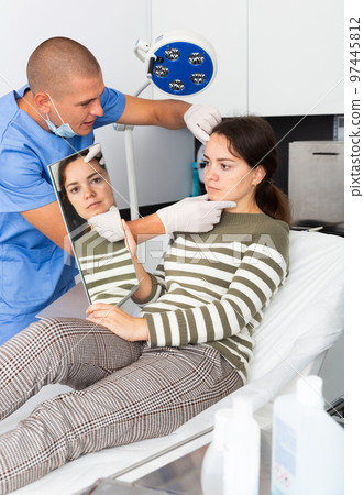 Woman having consultation with doctor in clinic Woman having consultation with doctor in clinic 97445812