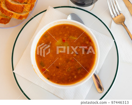 Potaje de lentejas, thick hearty lentil stew Potaje de lentejas, thick hearty lentil stew 97446313