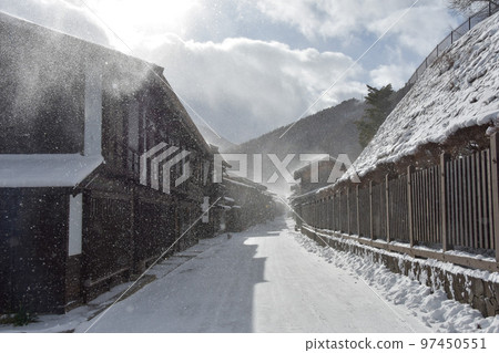 Nakasendo Kisoji Narai-juku with a snowy landscape 97450551