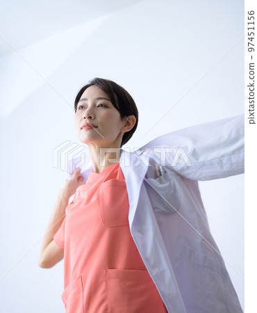 Image of a cool doctor (female doctor) wearing a white coat 97451156
