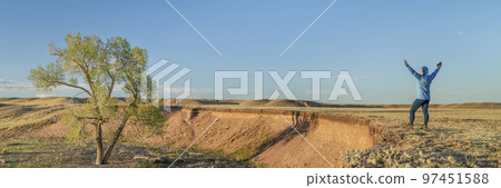 prairie in northern Colorado with a lonely male figure 97451588