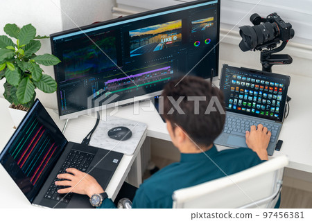 Video/video creator, male, video marketing, editing, advertising activities, bird's-eye view, multi-display, gimbal Video/video creator, male, video marketing, editing, advertising activities, bird's-eye view, multi-display, gimbal 97456381