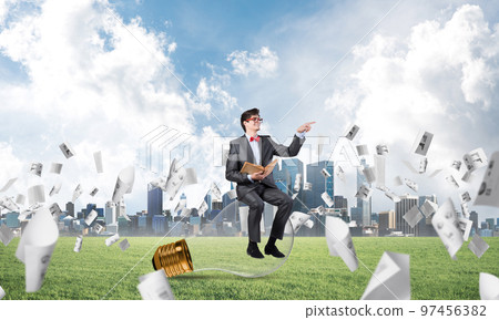 young businessman with a book young businessman with a book 97456382