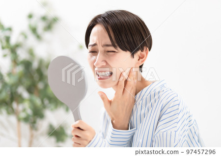 Female tooth worries 97457296