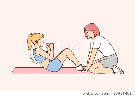 Woman training with coach in gym Woman training with coach in gym 97458491