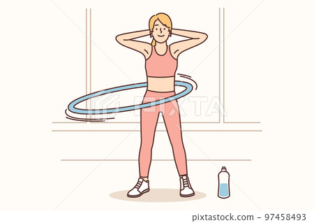 Toned woman training at home  97458493