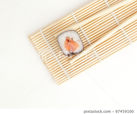large sushi and chopsticks .isolated on a light 97459100