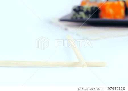different types of Maki sushi on a black plate different types of Maki sushi on a black plate 97459128
