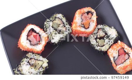 set of Sushi rolls on black plate set of Sushi rolls on black plate 97459149