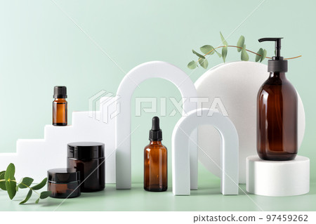 Various blank cosmetic container mock-ups on podiums and geometrical forms. Background for branding and packaging presentation Various blank cosmetic container mock-ups on podiums and geometrical forms. Background for branding and packaging presentation 97459262