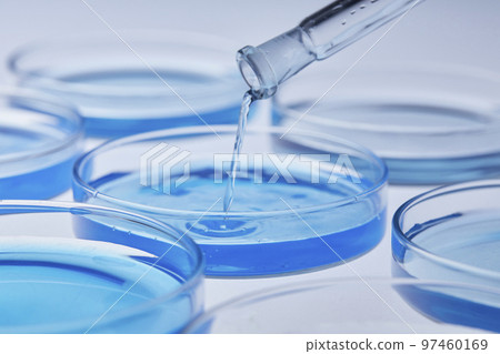 Science lab with beaker and dropper 97460169