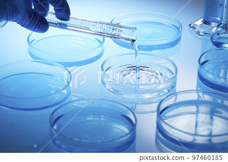 Science lab with beaker and dropper 97460185