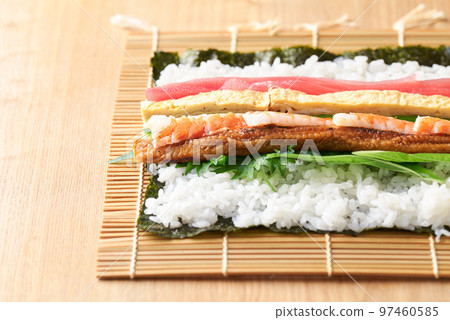 Ehomaki ingredients (tuna, omelet, cucumber, perilla, boiled conger eel, shrimp. 97460585