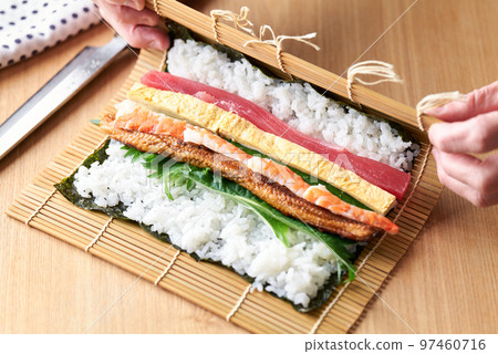 Ehomaki roll (Ingredients are tuna, omelet, cucumber, perilla, boiled conger eel, shrimp. 97460716