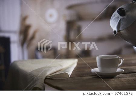 A relaxing break with fragrant coffee A relaxing break with fragrant coffee 97461572