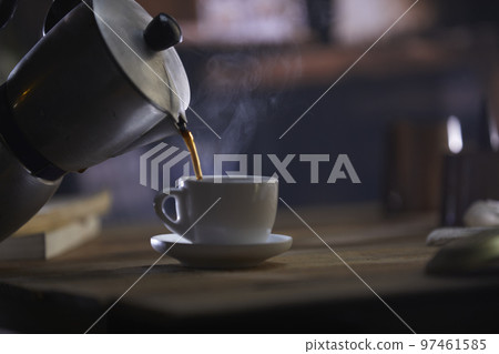 A relaxing break with fragrant coffee A relaxing break with fragrant coffee 97461585