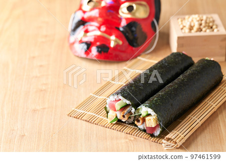 Ehomaki rolls arranged on a bamboo screen (Ingredients: tuna, boiled conger eel, cucumber, omelet, perilla, shrimp.) Ehomaki rolls arranged on a bamboo screen (Ingredients: tuna, boiled conger eel, cucumber, omelet, perilla, shrimp.) 97461599