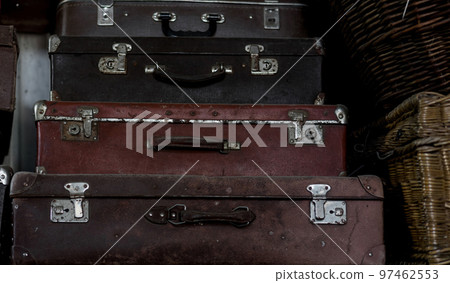 stack of old leather suitcases. stack of old leather suitcases. 97462553