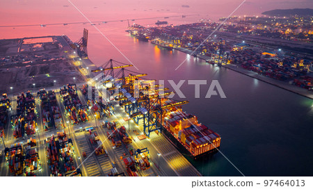 Aerial view of cargo ship and cargo container in harbor. 97464013