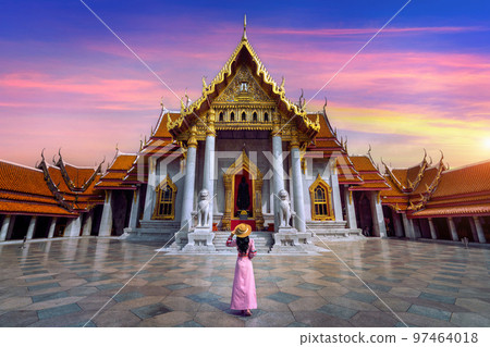 Tourists walking at Wat Benchamabophit or the Marble Temple in Bangkok, Thailand. Tourists walking at Wat Benchamabophit or the Marble Temple in Bangkok, Thailand. 97464018