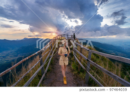 Tourist walking at Phu chi dao in Chiang Rai, Thailand. Tourist walking at Phu chi dao in Chiang Rai, Thailand. 97464039