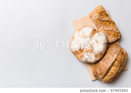 Homemade natural breads. Different kinds of fresh bread as background, top view with copy space 97465993