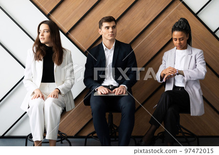 Business people waiting for job interview Business people waiting for job interview 97472015