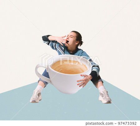 Contemporary art collage. Creative design. Young woman sitting with empty cup with coffee and yawning. Sleepy Contemporary art collage. Creative design. Young woman sitting with empty cup with coffee and yawning. Sleepy 97473392