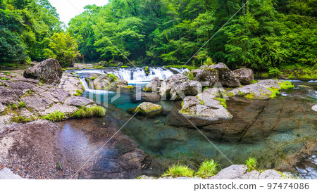 Summer scenery of beautiful mountain streams, valleys and clear streams ``Tourist attraction: Kikuchi Gorge'' Kikuchi City, Kumamoto Prefecture, Japan Summer scenery of beautiful mountain streams, valleys and clear streams ``Tourist attraction: Kikuchi Gorge'' Kikuchi City, Kumamoto Prefecture, Japan 97474086