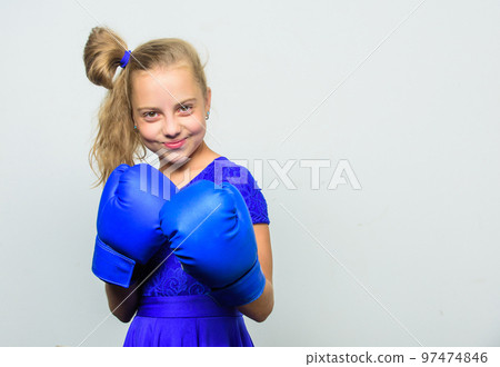 little girl in boxing gloves punching. knockout and energy. Sport success. training with coach. Fight. Boxer child workout, healthy fitness. Sport and sportswear fashion, copy space. Ready to fight little girl in boxing gloves punching. knockout and energy. Sport success. training with coach. Fight. Boxer child workout, healthy fitness. Sport and sportswear fashion, copy space. Ready to fight 97474846