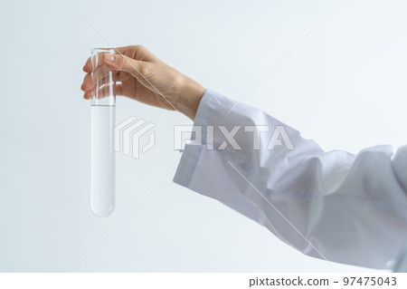 Hand with test tube 97475043