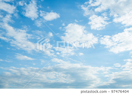 cloudy blue sky with white fluffy clouds. cloudscape background 97476404