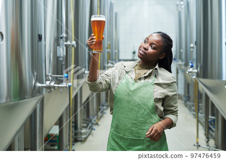 Worker Checking Beer Quality 97476459