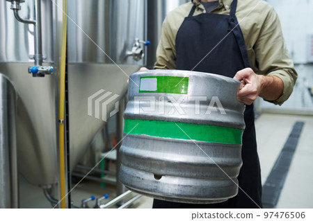 Microbrewery Worker Carrying Keg Microbrewery Worker Carrying Keg 97476506