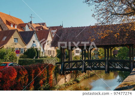 Bridge over the Metter in Bietigheim-Bissingen. Little greek in Bietigheim-Bissingen with autumn colors. Metter, a river in Bietigheim-Bissingen 97477274
