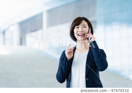 Young business woman working in the office 97479318