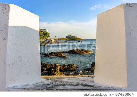 Famous Barra Lighthouse seen through the walls of the fortress of Santa Maria 97480004
